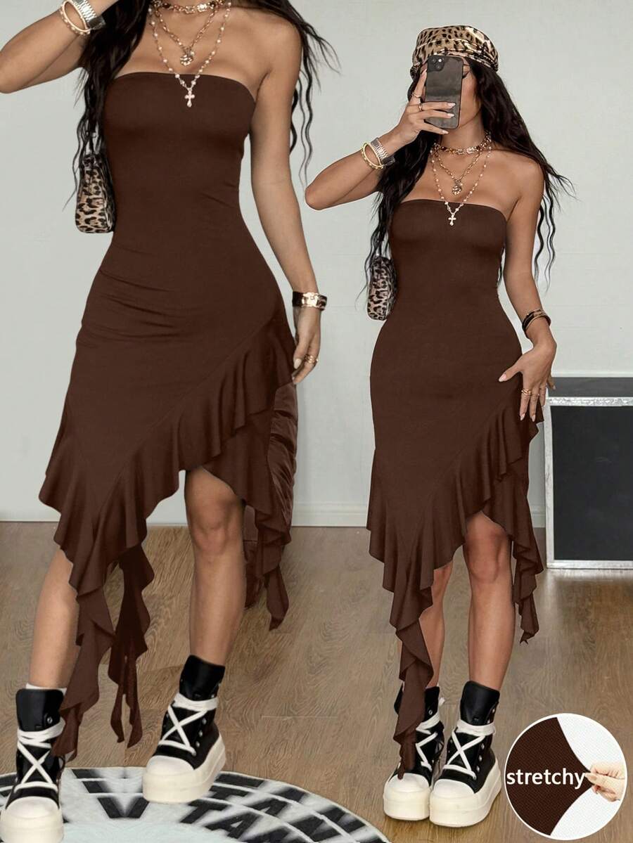 Women's strapless black bandeau midi dress featuring an asymmetrical ruffle hem and a slim fit bodycon silhouette.