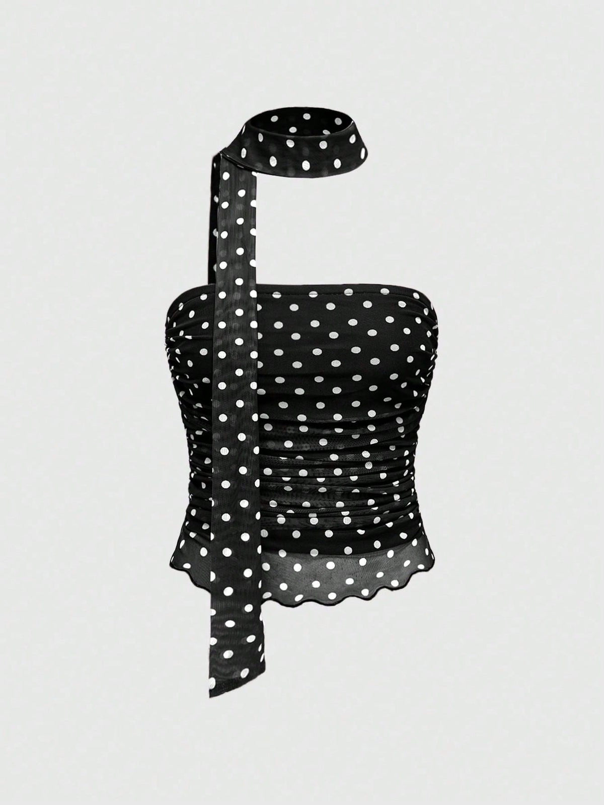 Women's black polka dot strapless tube top made of ruched mesh fabric featuring an asymmetrical hem and matching scarf.