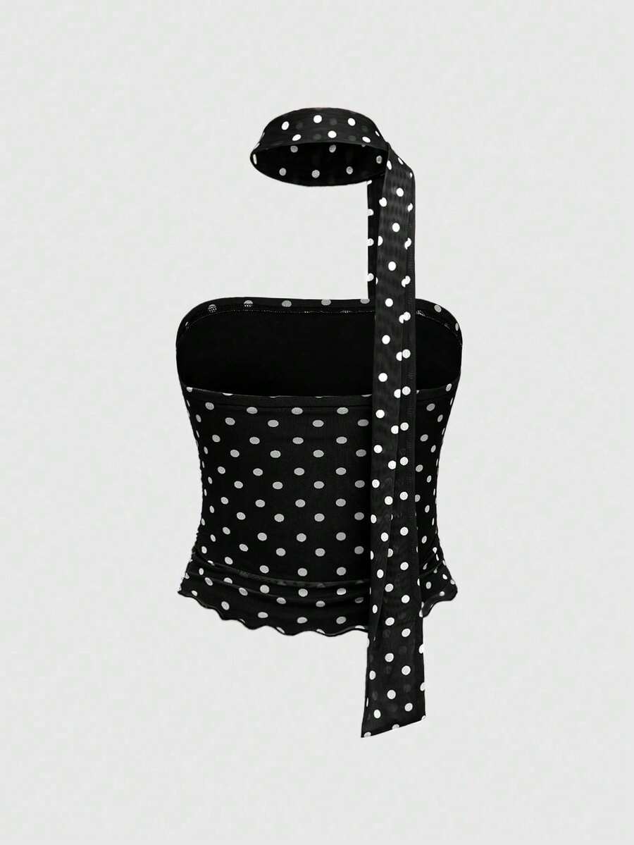 Women's black polka dot strapless tube top made of ruched mesh fabric featuring an asymmetrical hem and matching scarf.