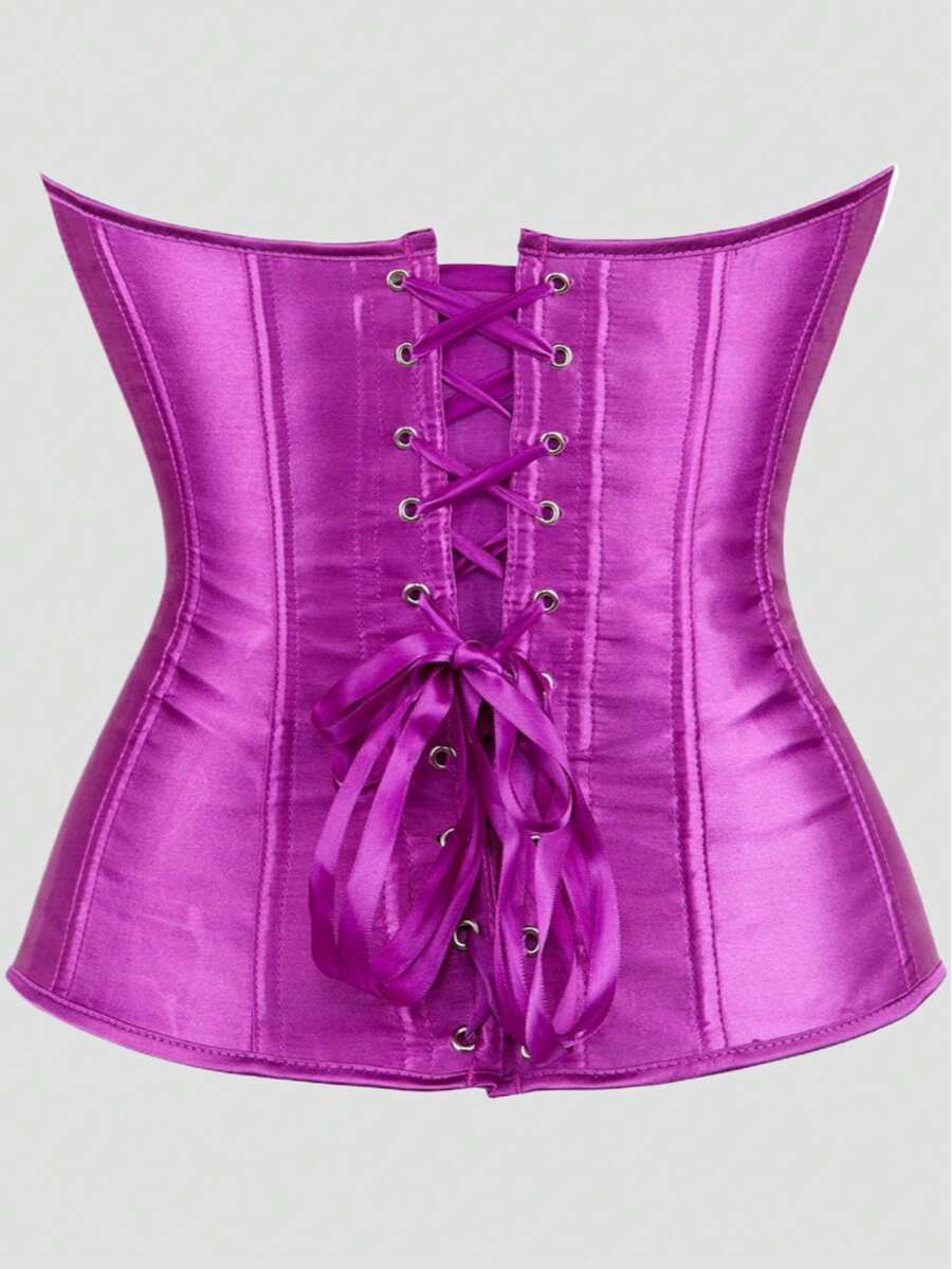 Blue satin bustier corset with front closure, back lace-up detail, and boned shaping for a retro-inspired party look.