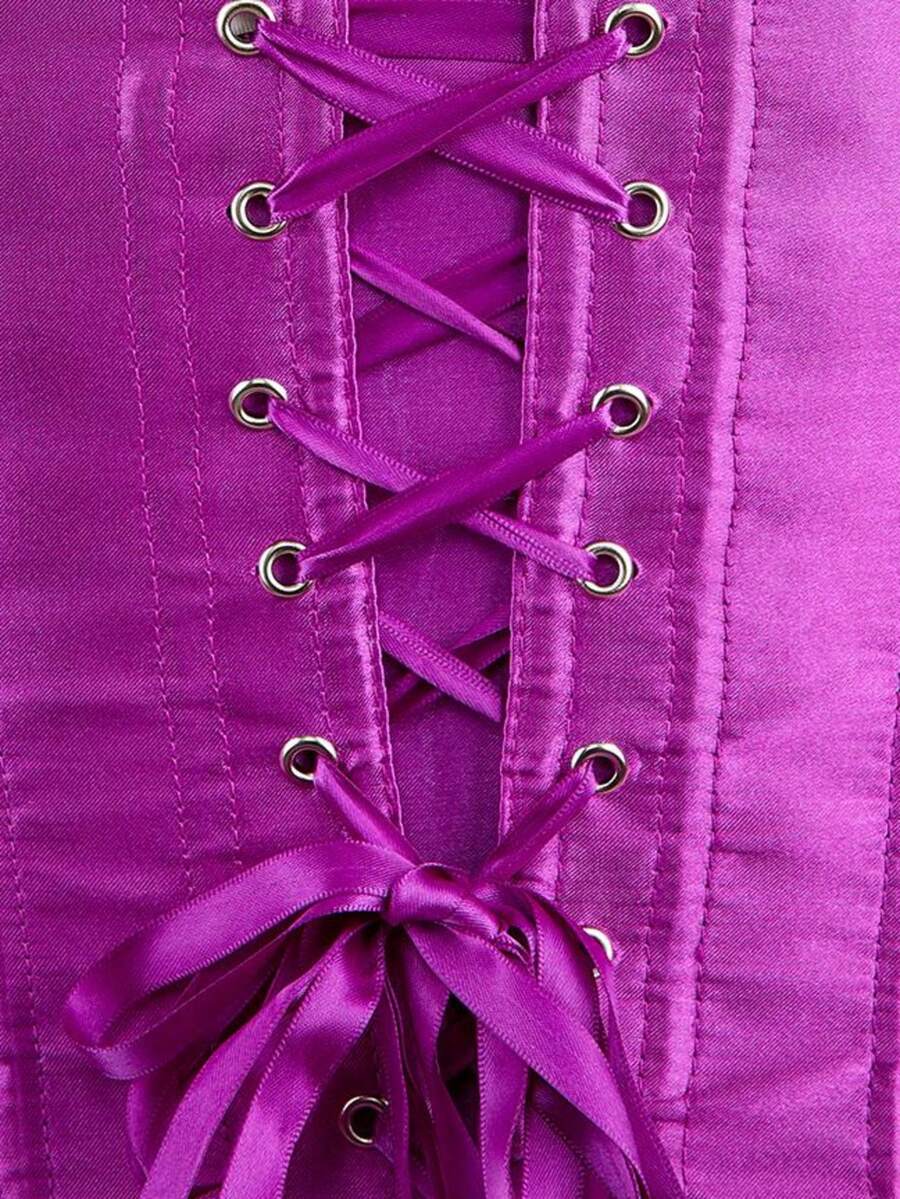 Blue satin bustier corset with front closure, back lace-up detail, and boned shaping for a retro-inspired party look.