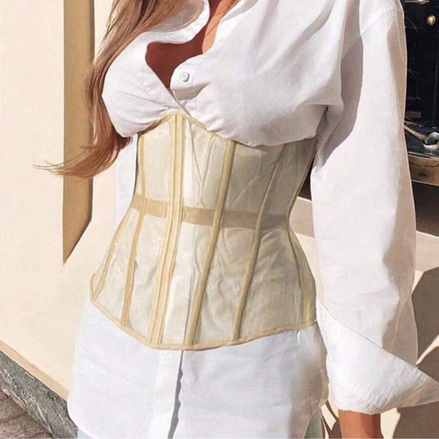 Women's apricot mesh shaping short corset with a lace-up front detail and slim-fit waist shaper design.