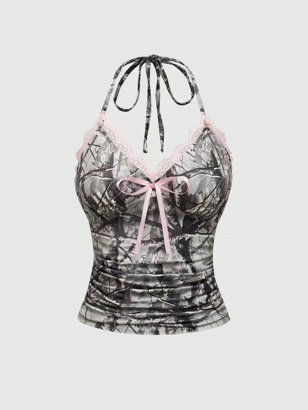 Women's slim fit camo crop tank top styled with contrast lace trim, front bow accent, and matching arm sleeves.