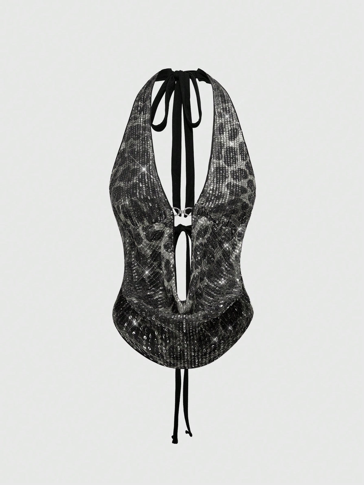 Women's leopard print sequin halter crop top featuring a backless asymmetrical hem design with ring accent.