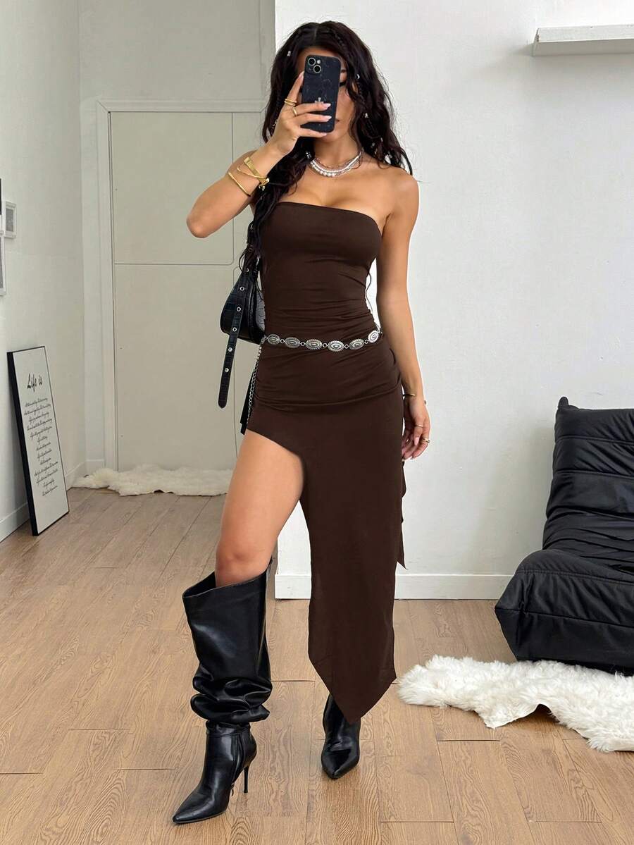 Black strapless lace asymmetrical long dress for women featuring ruched detailing, a split thigh, and a slim fit bodycon silhouette.