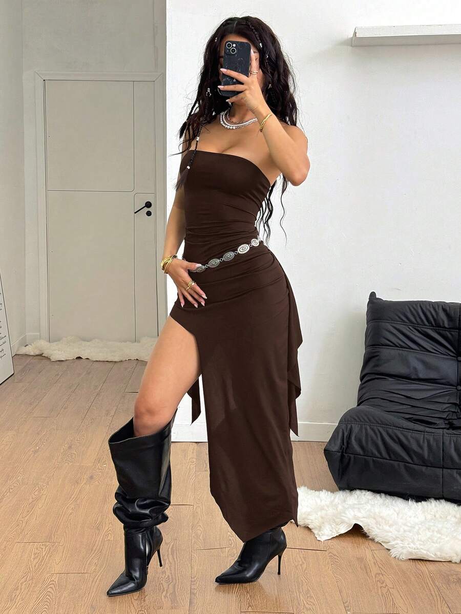 Black strapless lace asymmetrical long dress for women featuring ruched detailing, a split thigh, and a slim fit bodycon silhouette.