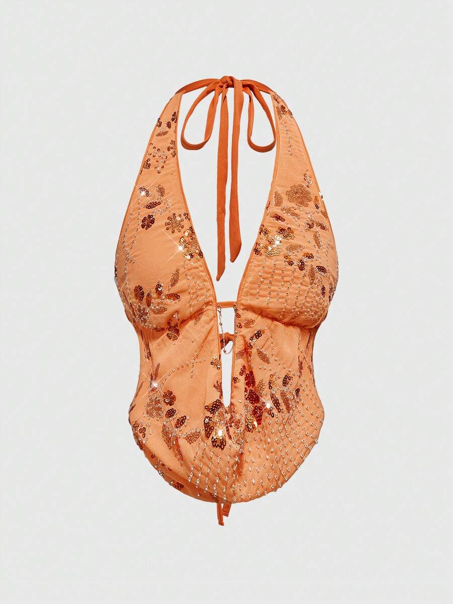 Pink sequin halter tank top for women featuring embroidered draped backless design and asymmetrical hem.