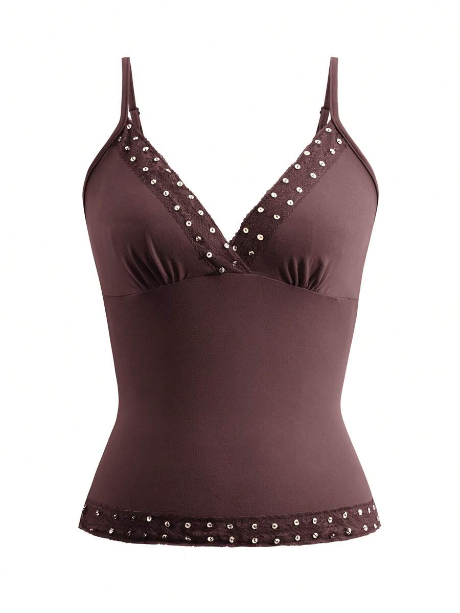 Women's deep V-neck camisole top featuring contrast hollow lace trim, cutout detail, and thin spaghetti straps.