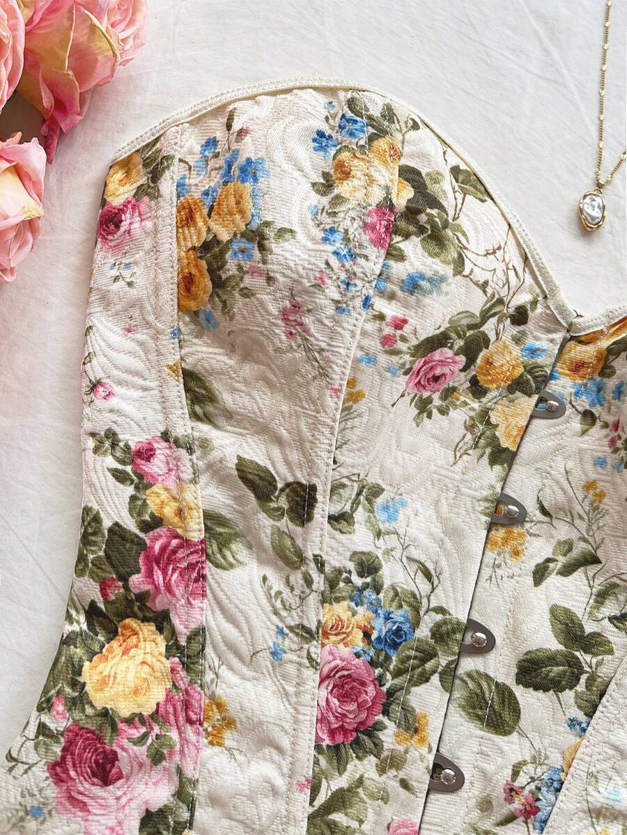 Women's apricot retro floral print bandeau crop top featuring a strapless asymmetrical neckline, lace-up back tie detail, and ruched slim fit woven fabric.