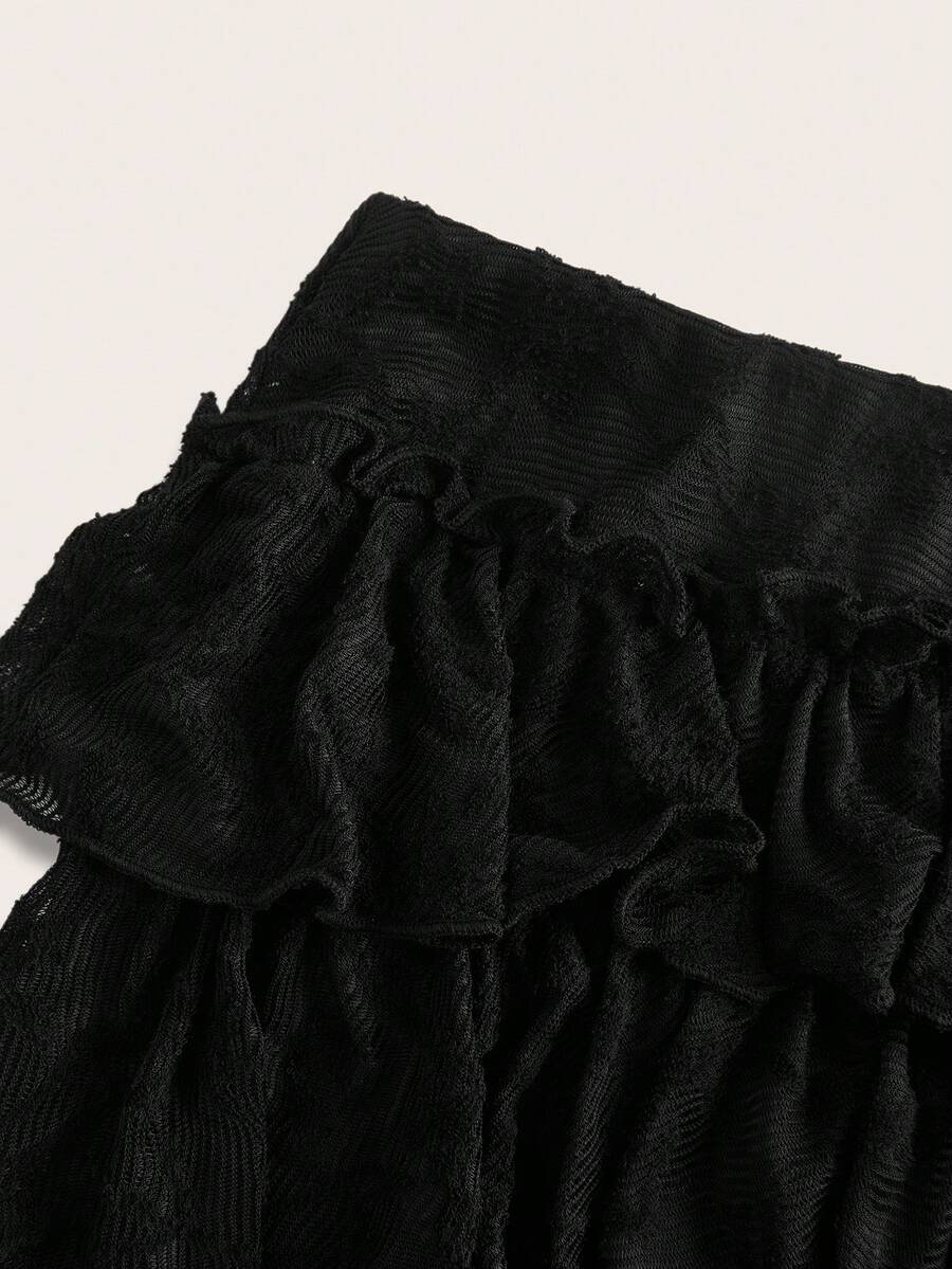 Women's lace tiered asymmetrical maxi skirt featuring a low waist and high slit thigh design.