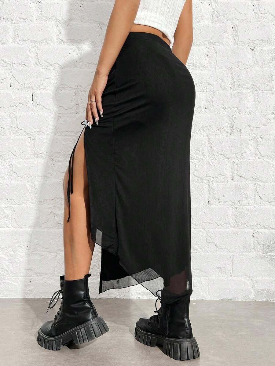 Women's black high-waisted bodycon long skirt featuring a drawstring split thigh detail and mesh fabric.