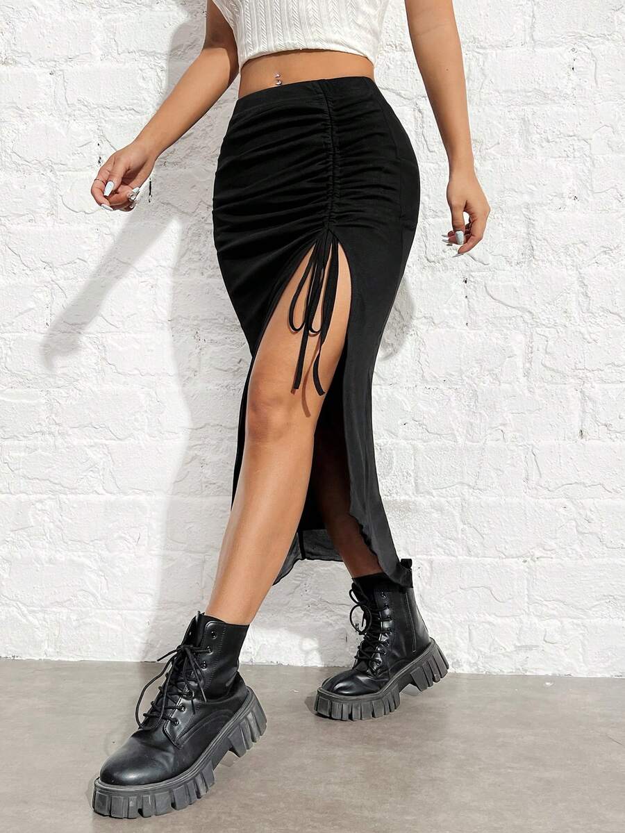 Women's black high-waisted bodycon long skirt featuring a drawstring split thigh detail and mesh fabric.