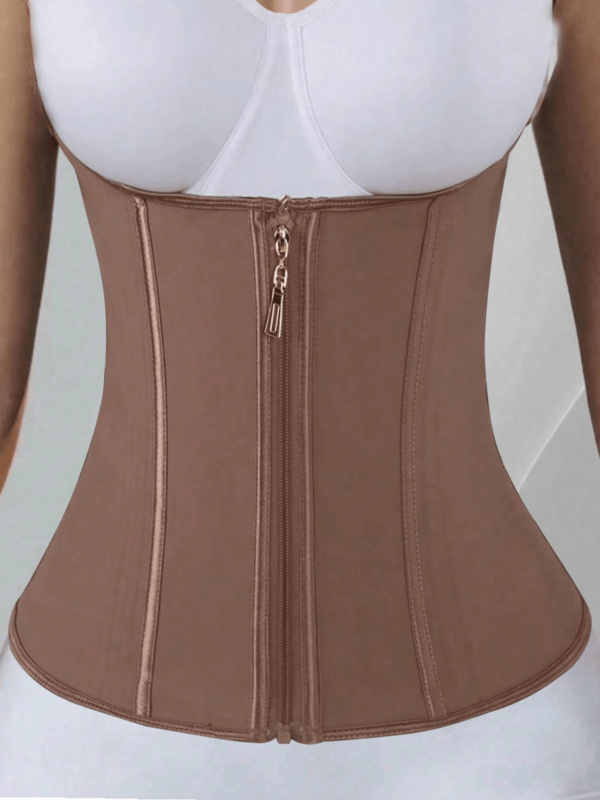 Women's latex waist trainer body shaper featuring zipper front closure and strong tummy support.