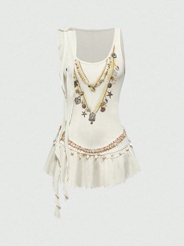 Beige asymmetric cami top for women featuring beaded details, fringe trim, knot accents, and round neck in high stretch knitted fabric.