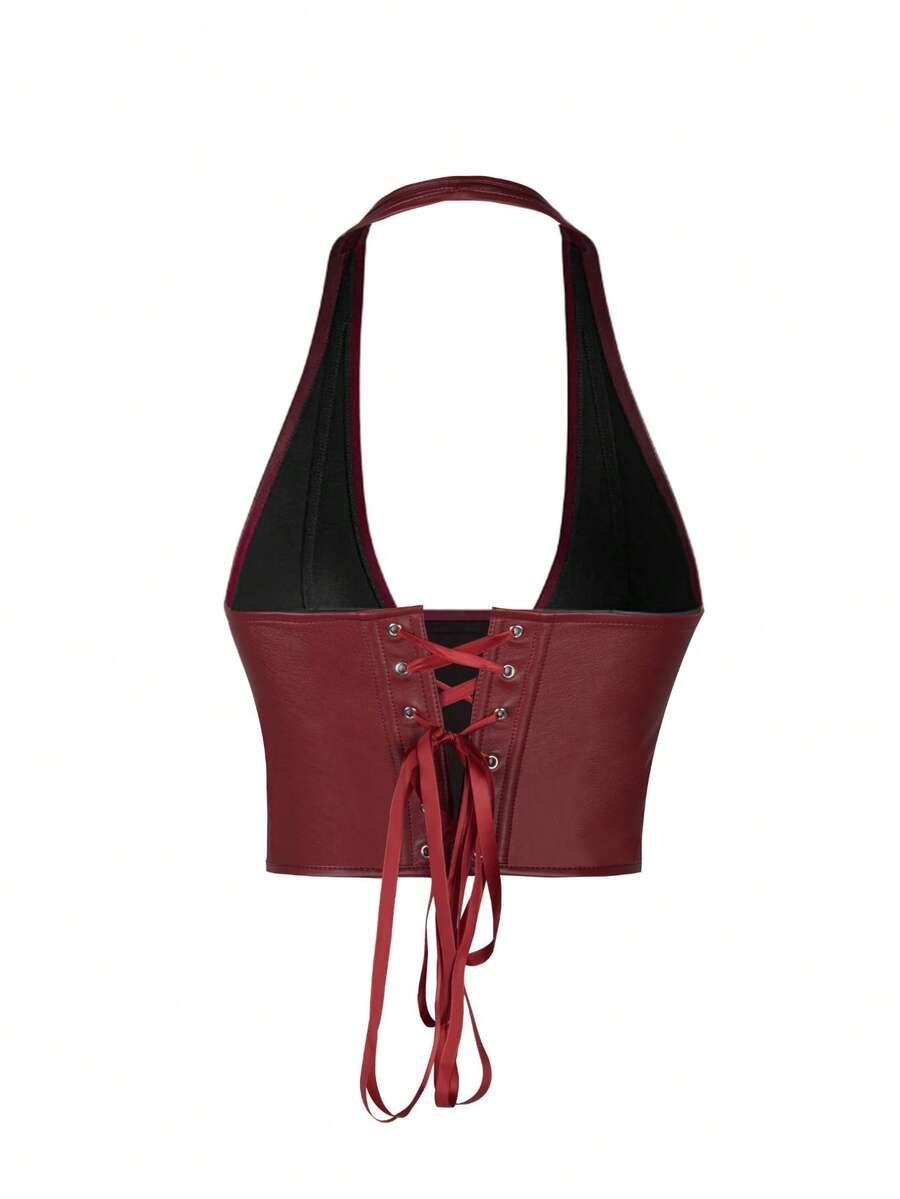 Black PU leather halter crop top for women with a backless design, split detail, tie-back closure, and grommet eyelets.