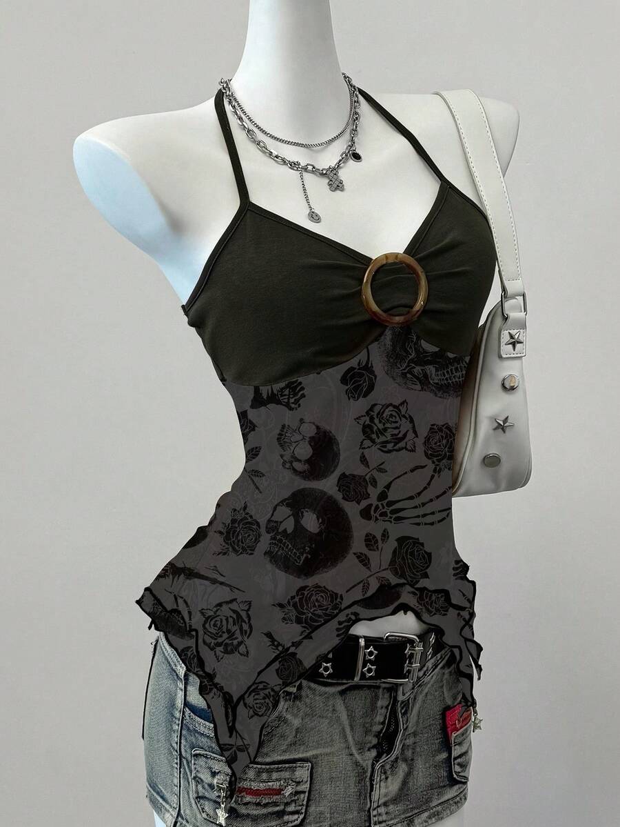 Women's backless halter cami top featuring a paisley print, sleeveless design, and an asymmetrical hem in knitted fabric.