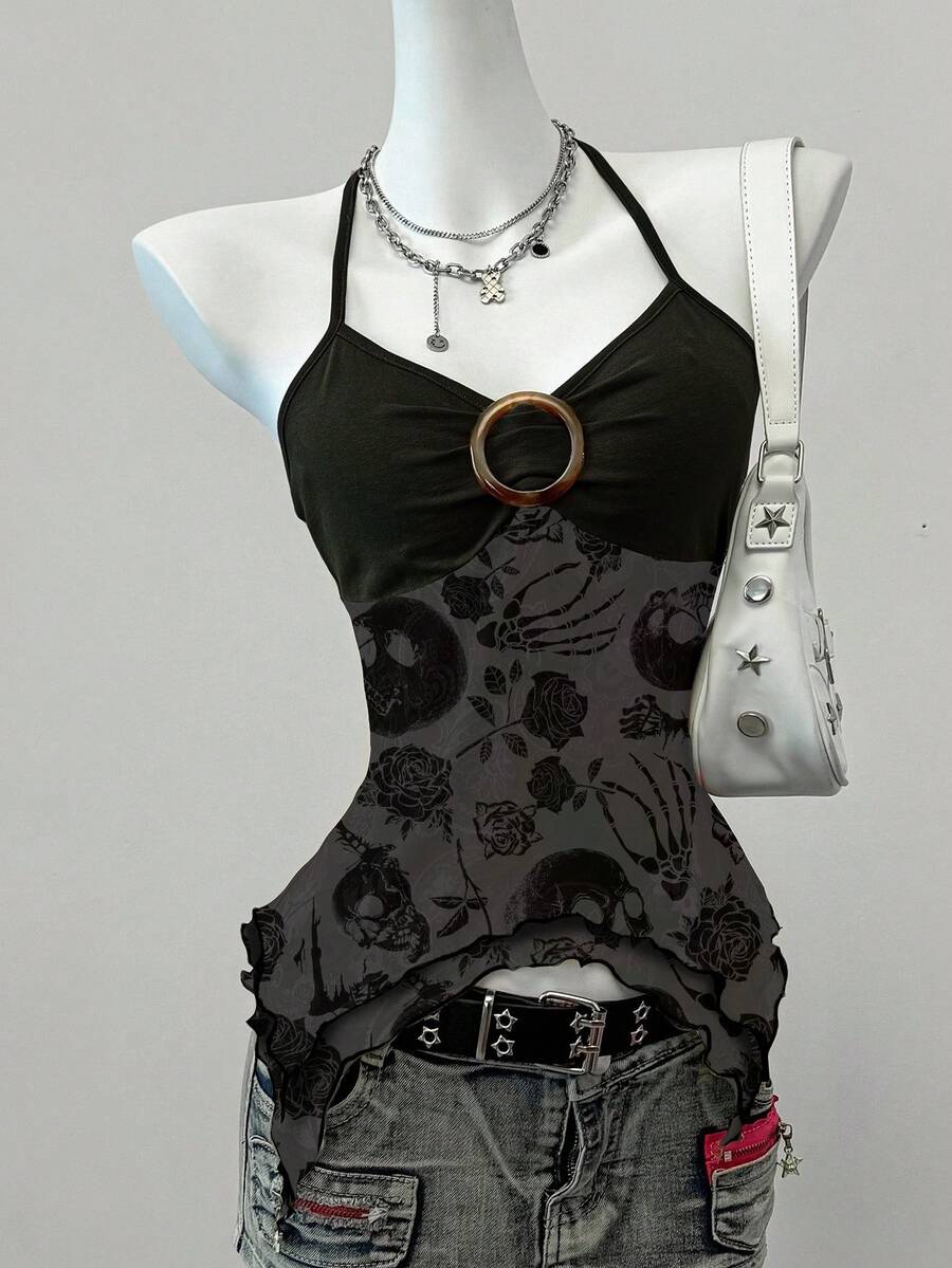 Women's backless halter cami top featuring a paisley print, sleeveless design, and an asymmetrical hem in knitted fabric.