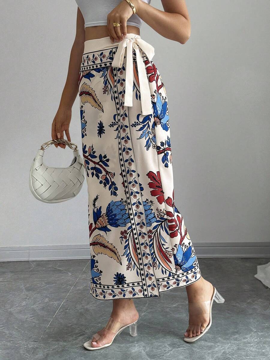 women's multicolor floral print wrap skirt featuring a high-waisted tie belt, A-line long silhouette, and boho woven fabric.