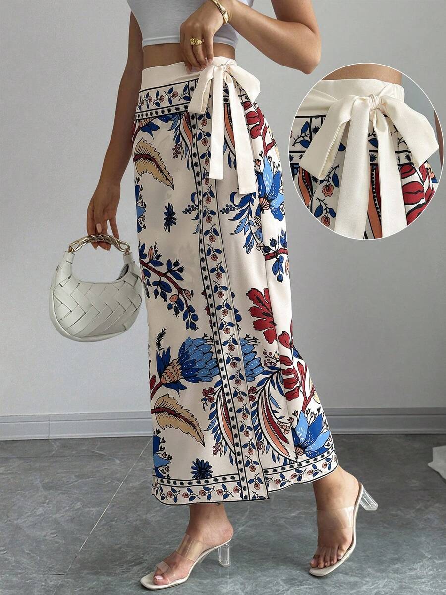 women's multicolor floral print wrap skirt featuring a high-waisted tie belt, A-line long silhouette, and boho woven fabric.