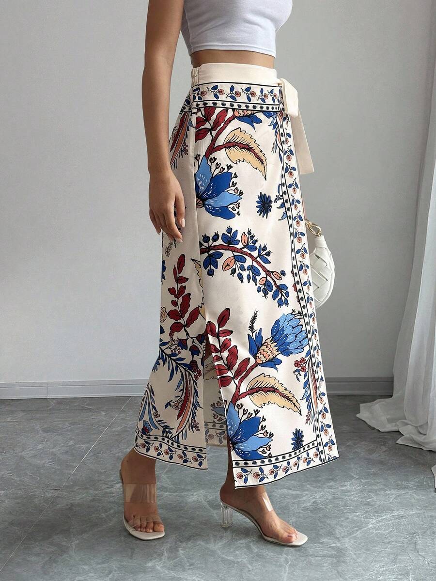 women's multicolor floral print wrap skirt featuring a high-waisted tie belt, A-line long silhouette, and boho woven fabric.