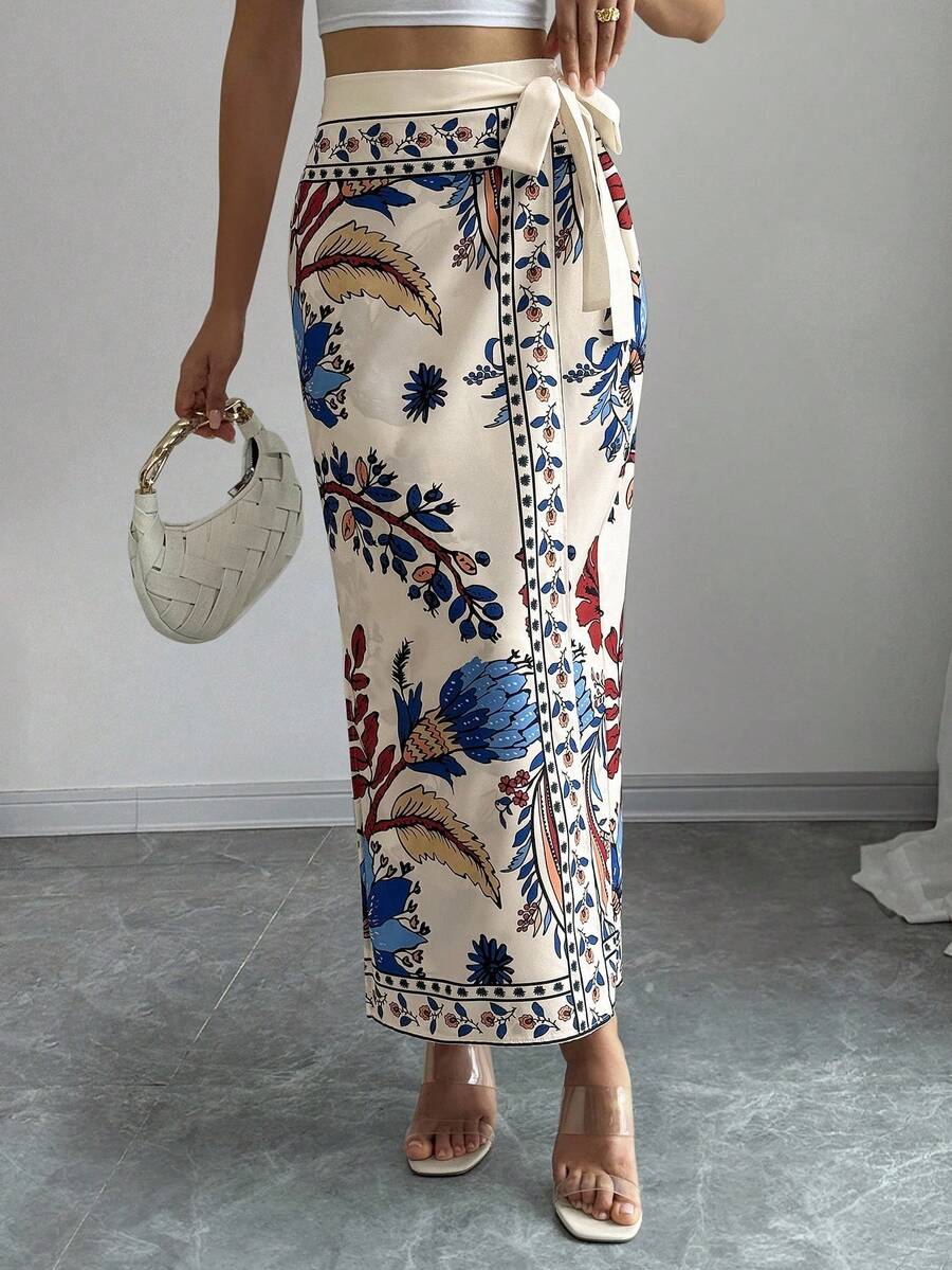women's multicolor floral print wrap skirt featuring a high-waisted tie belt, A-line long silhouette, and boho woven fabric.