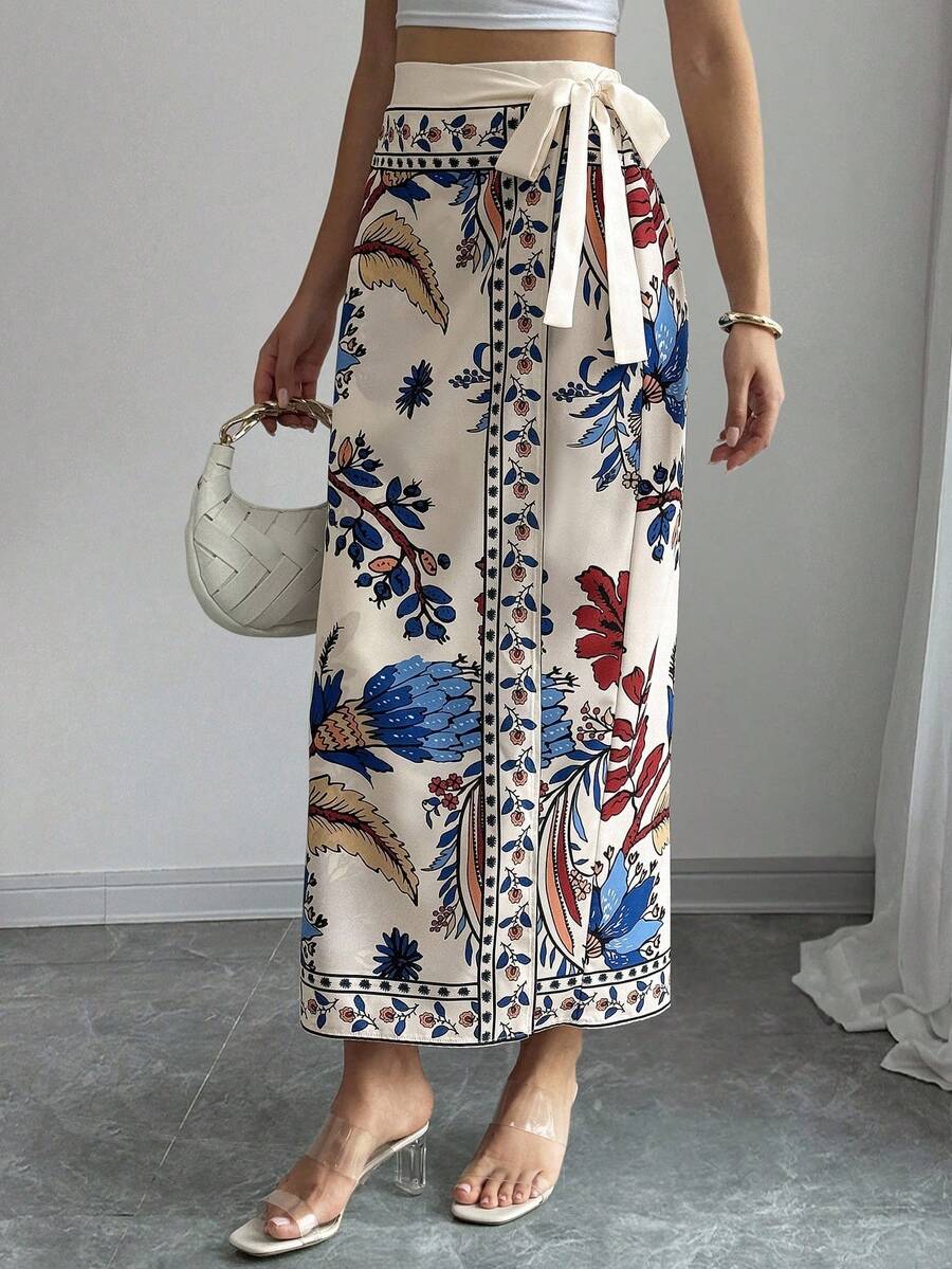 women's multicolor floral print wrap skirt featuring a high-waisted tie belt, A-line long silhouette, and boho woven fabric.