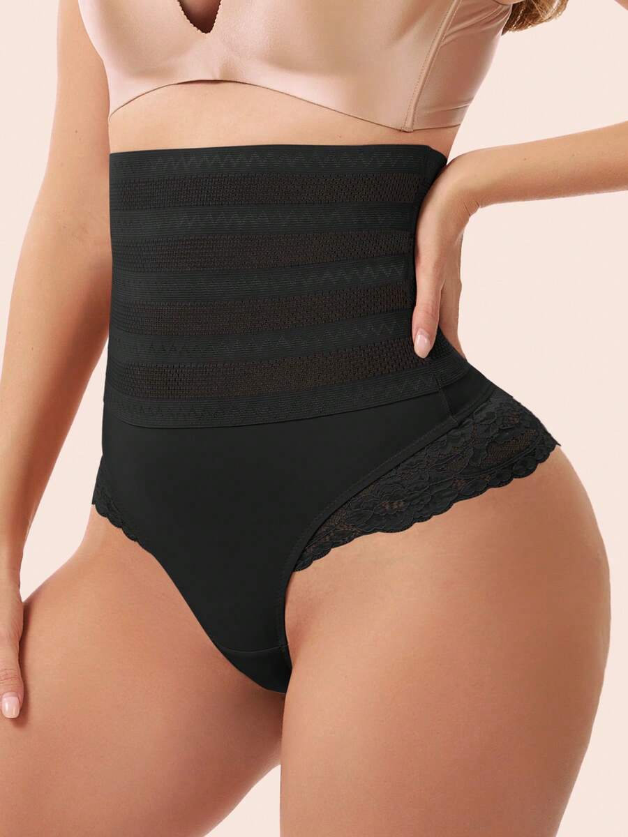 Women's black high waist tummy control shaping thong with contrast lace details and medium compression support.