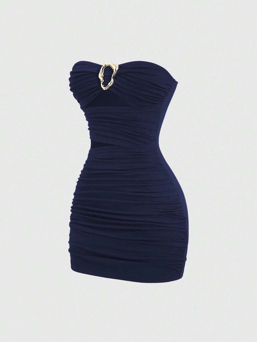 Women's black strapless bodycon mini dress featuring ruched detailing, cut-out design with ring accent, mid-waist pencil hem, and slim fit knitted stretch fabric.