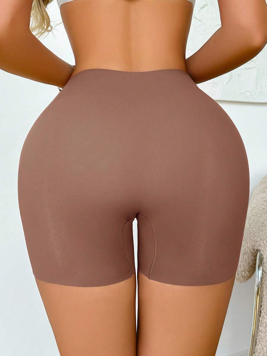 Women wearing apricot super high waist shapewear shorts designed for ultra-light thigh smoothing