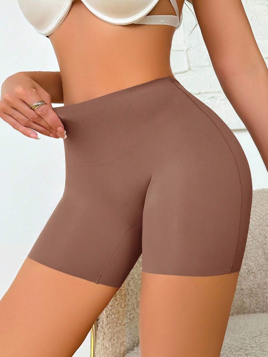 Women wearing apricot super high waist shapewear shorts designed for ultra-light thigh smoothing