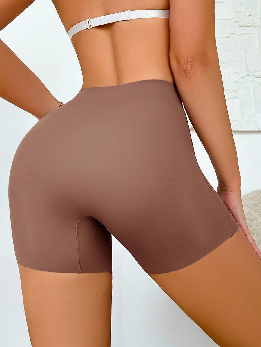 Women wearing apricot super high waist shapewear shorts designed for ultra-light thigh smoothing
