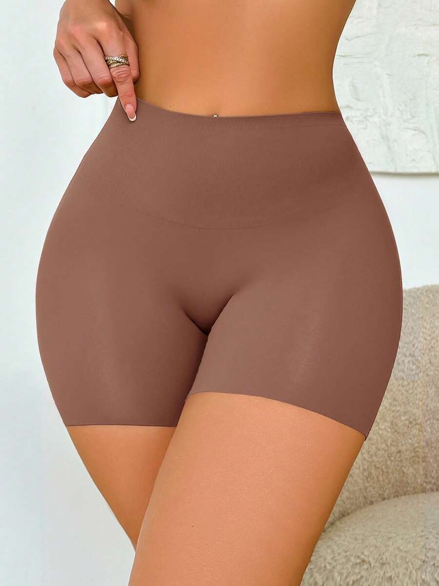 Women wearing apricot super high waist shapewear shorts designed for ultra-light thigh smoothing