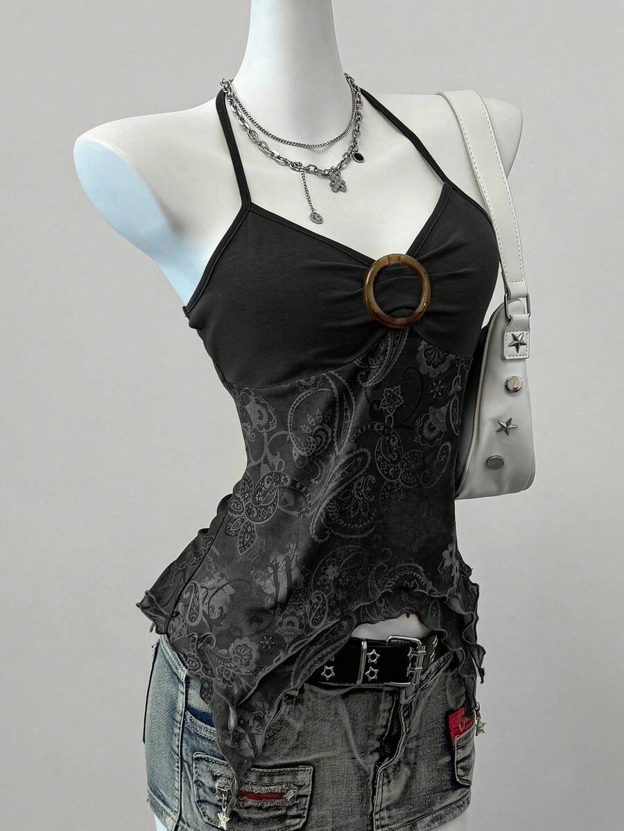 Women's backless halter cami top featuring a paisley print, sleeveless design, and an asymmetrical hem in knitted fabric.