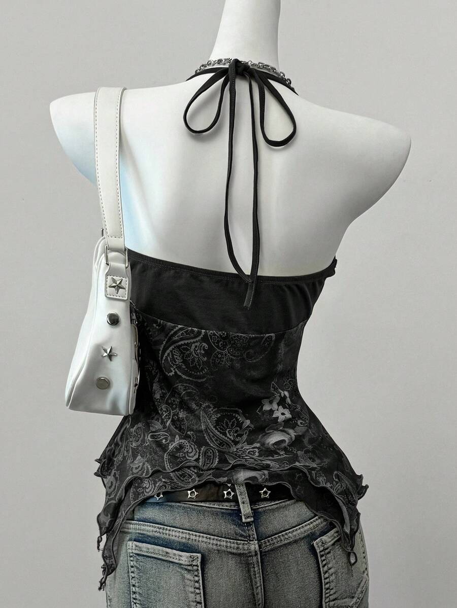 Women's backless halter cami top featuring a paisley print, sleeveless design, and an asymmetrical hem in knitted fabric.
