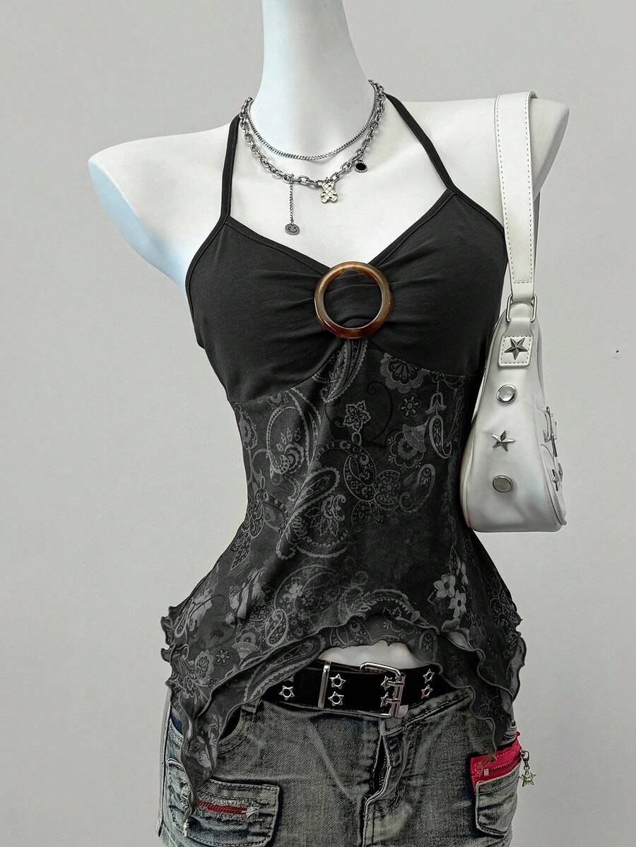 Women's backless halter cami top featuring a paisley print, sleeveless design, and an asymmetrical hem in knitted fabric.