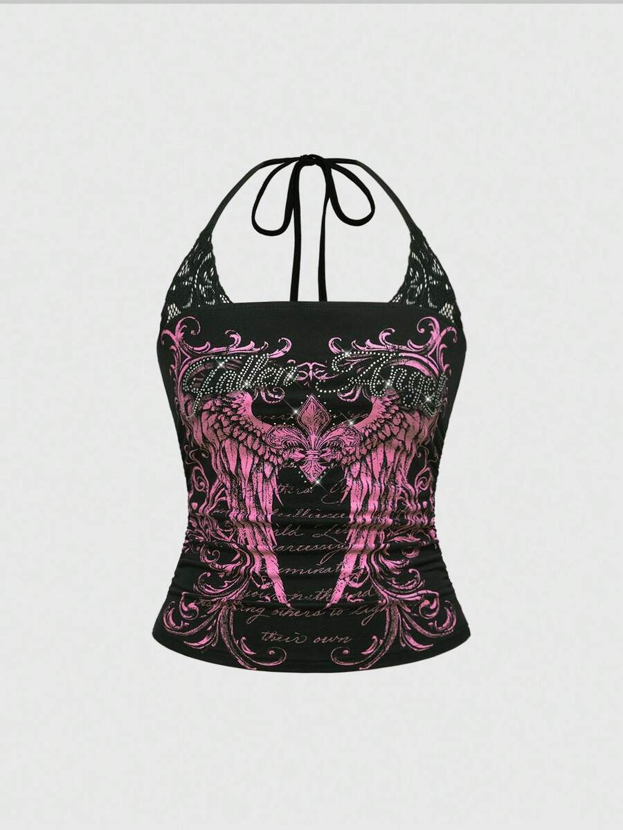 Woman wearing a black Y2K concert print 2-in-1 contrast lace halter crop top featuring a backless design with knot details.