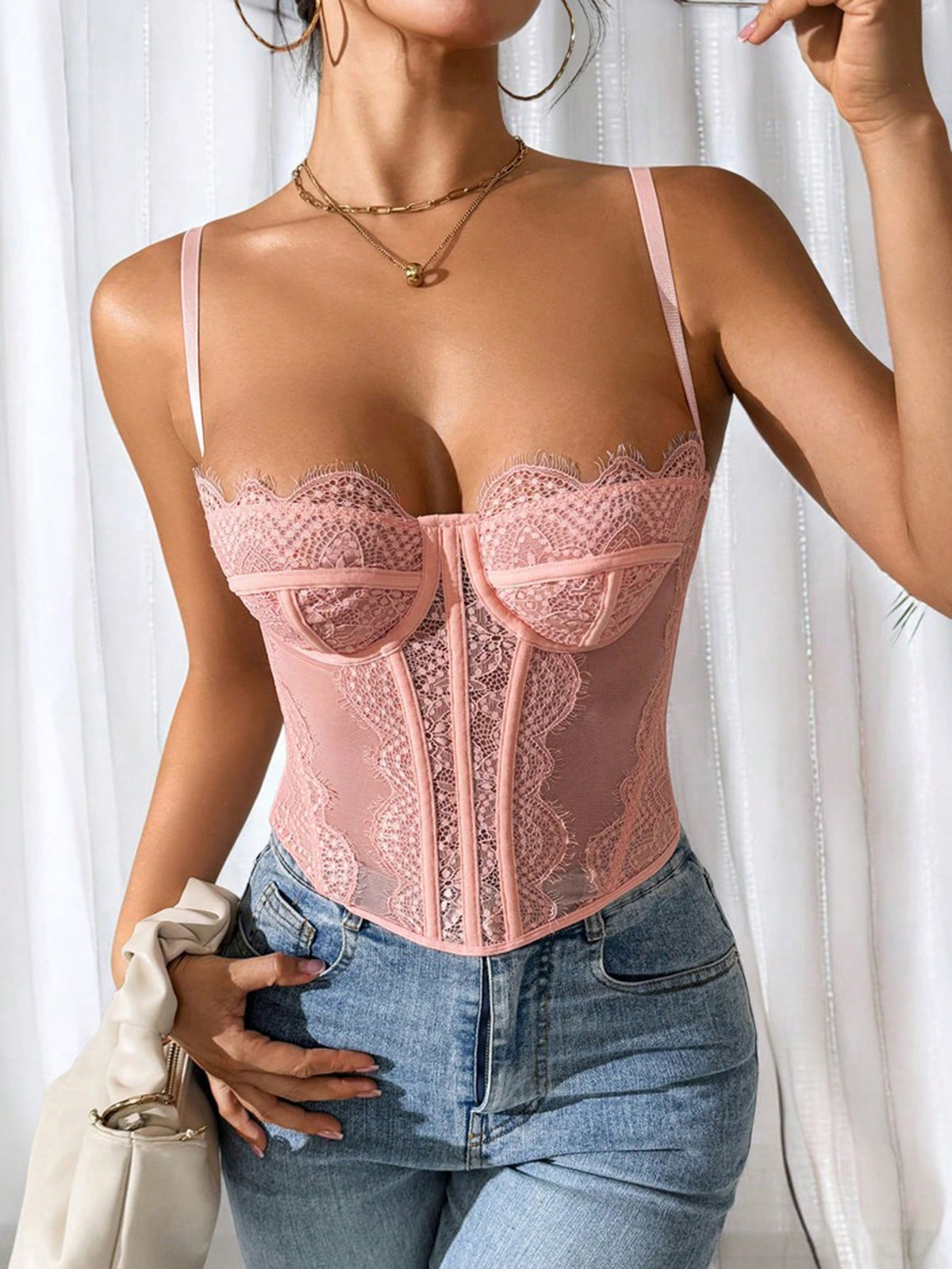 Women's brown lace trim cami corset crop top featuring a low cut neck, unlined body, and slim fit bodycon silhouette.