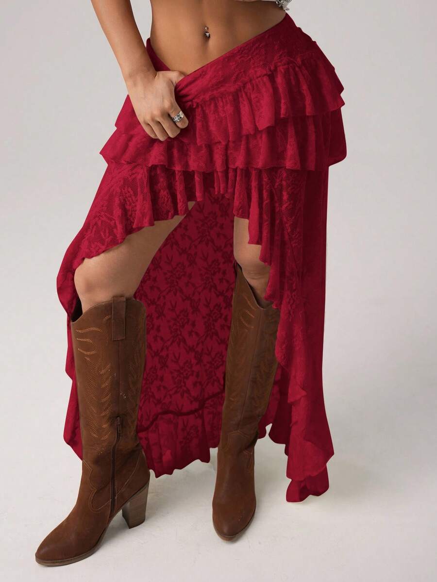 Women's lace tiered asymmetrical maxi skirt featuring a low waist and high slit thigh design.