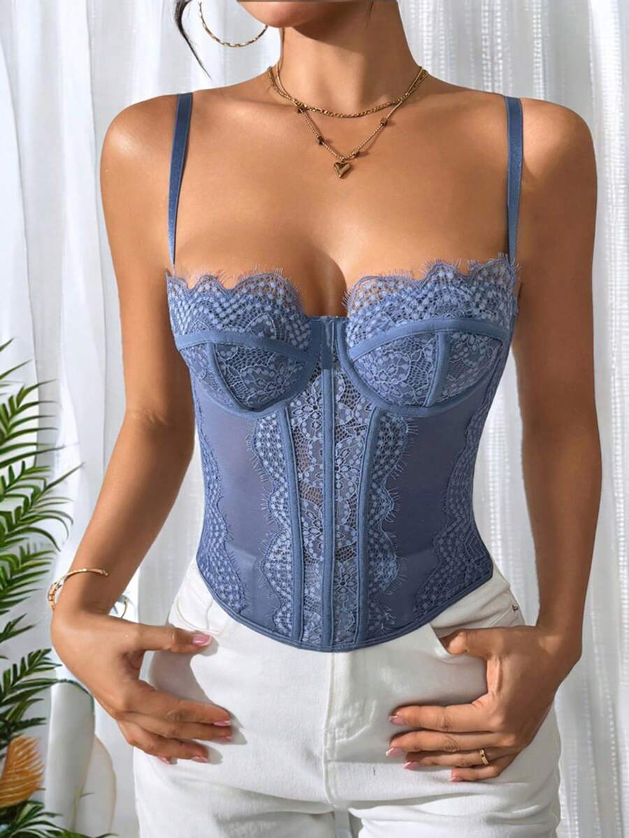 Women's brown lace trim cami corset crop top featuring a low cut neck, unlined body, and slim fit bodycon silhouette.