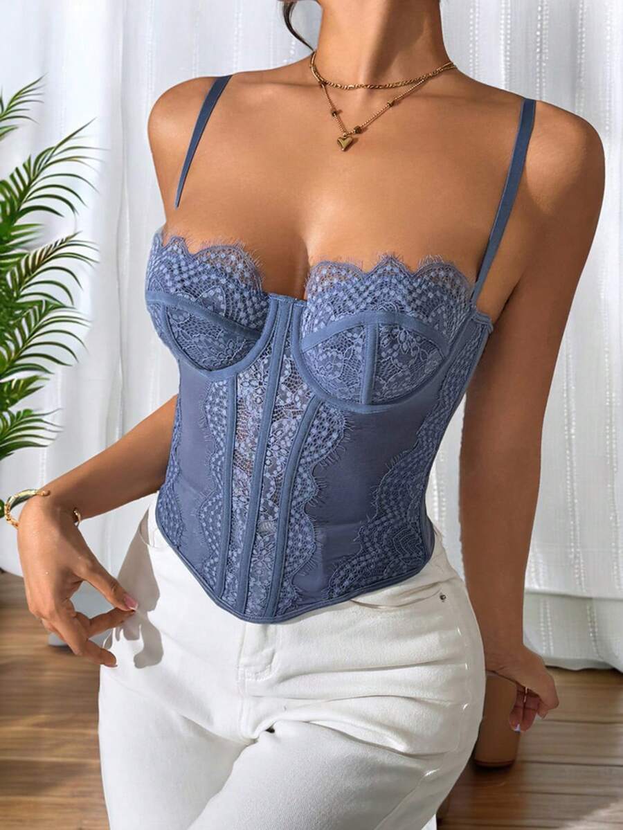 Women's brown lace trim cami corset crop top featuring a low cut neck, unlined body, and slim fit bodycon silhouette.