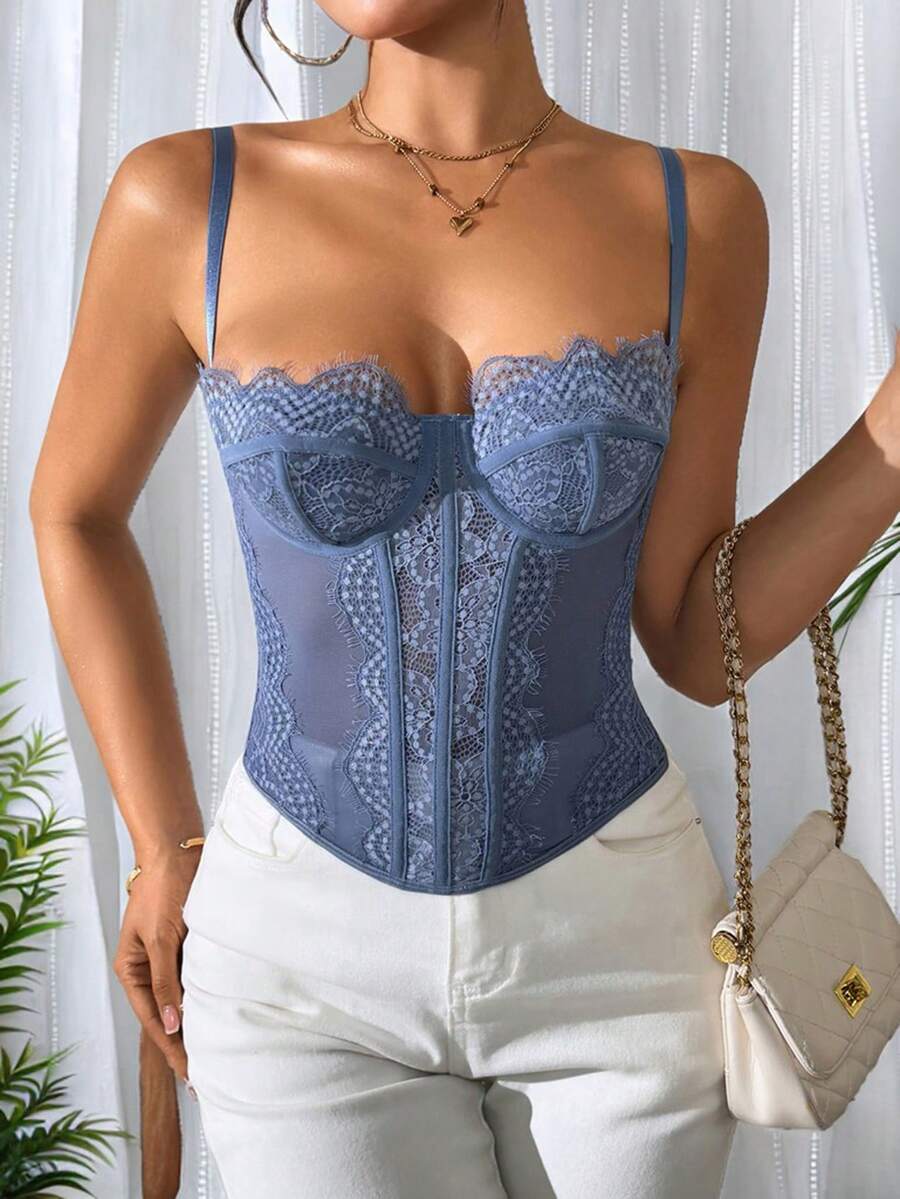 Women's brown lace trim cami corset crop top featuring a low cut neck, unlined body, and slim fit bodycon silhouette.