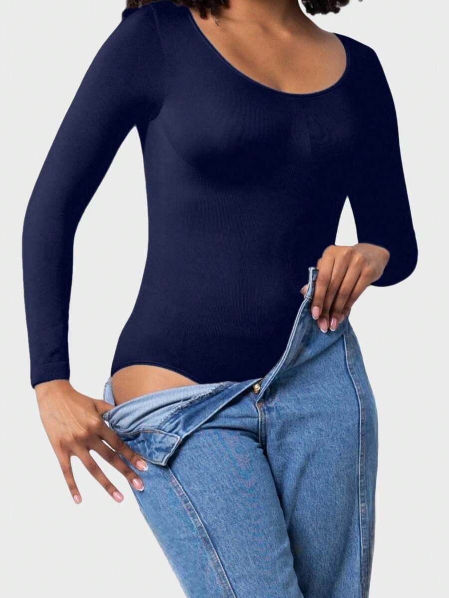 Black seamless long sleeve crew neck shapewear bodysuit for women featuring full coverage tummy control.