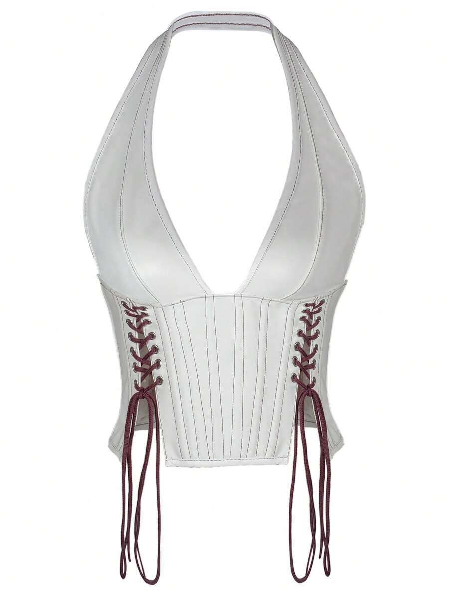 Black PU leather halter crop top for women with a backless design, split detail, tie-back closure, and grommet eyelets.