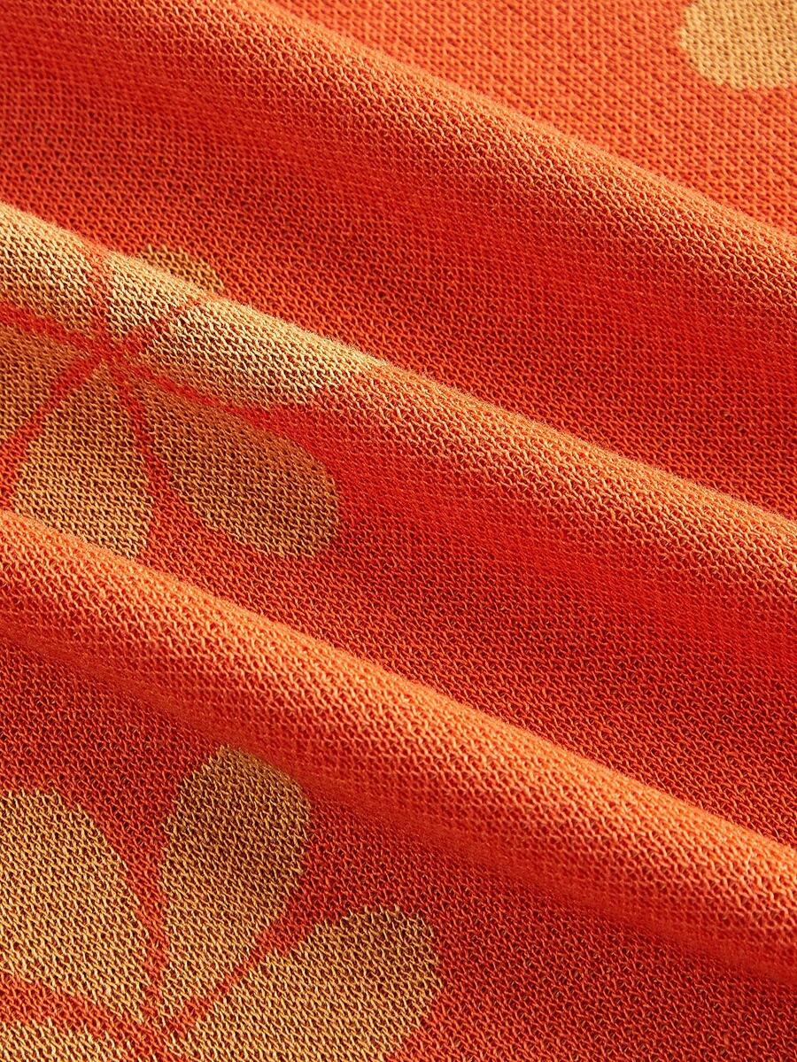 Orange women's floral pattern knit mermaid maxi skirt featuring rib-knit fabric, natural mid waist, slim fit silhouette, and unlined design.