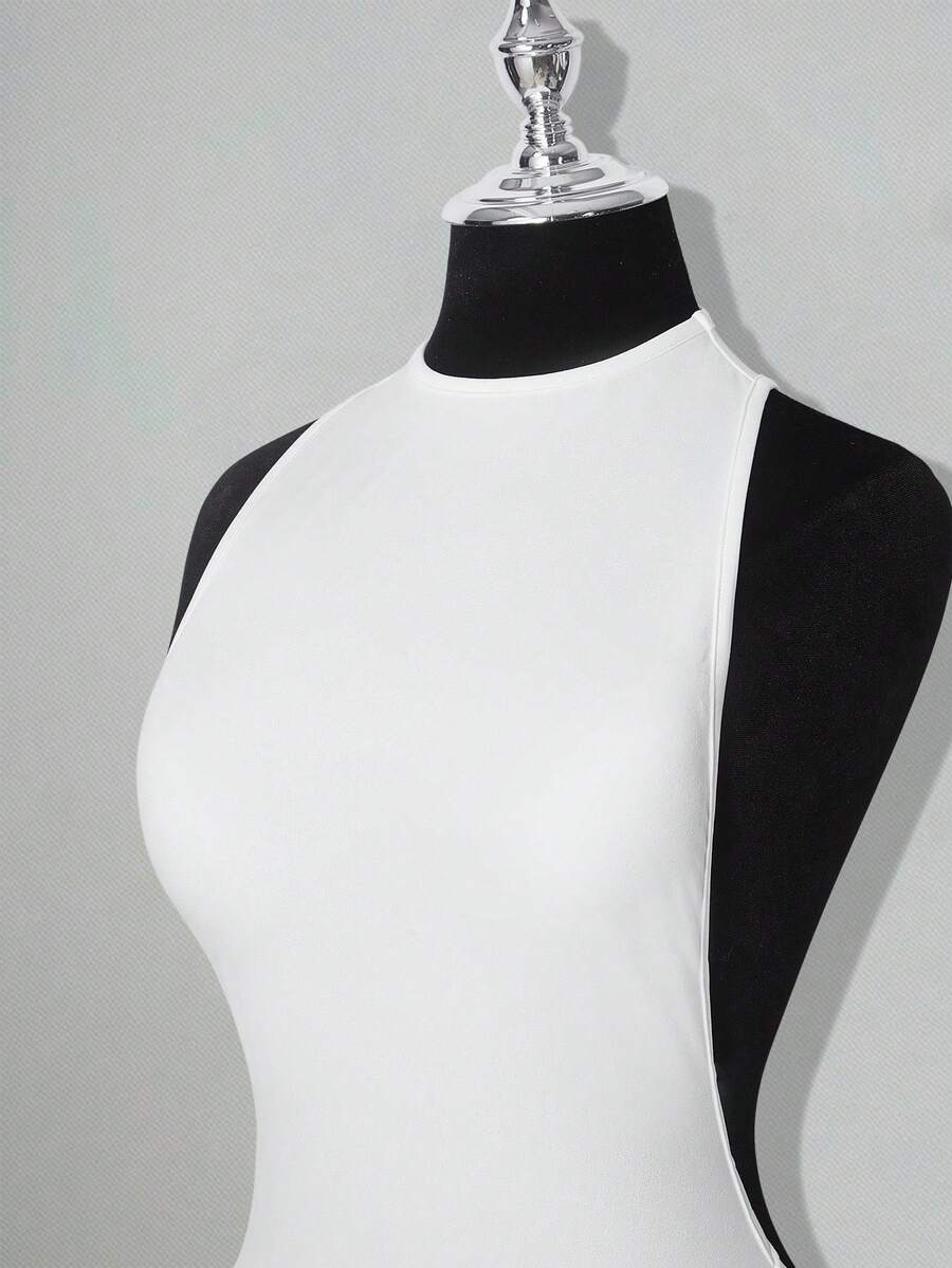 Apricot criss-cross backless bodycon mini dress for women featuring a round neck and rhinestone accent details.
