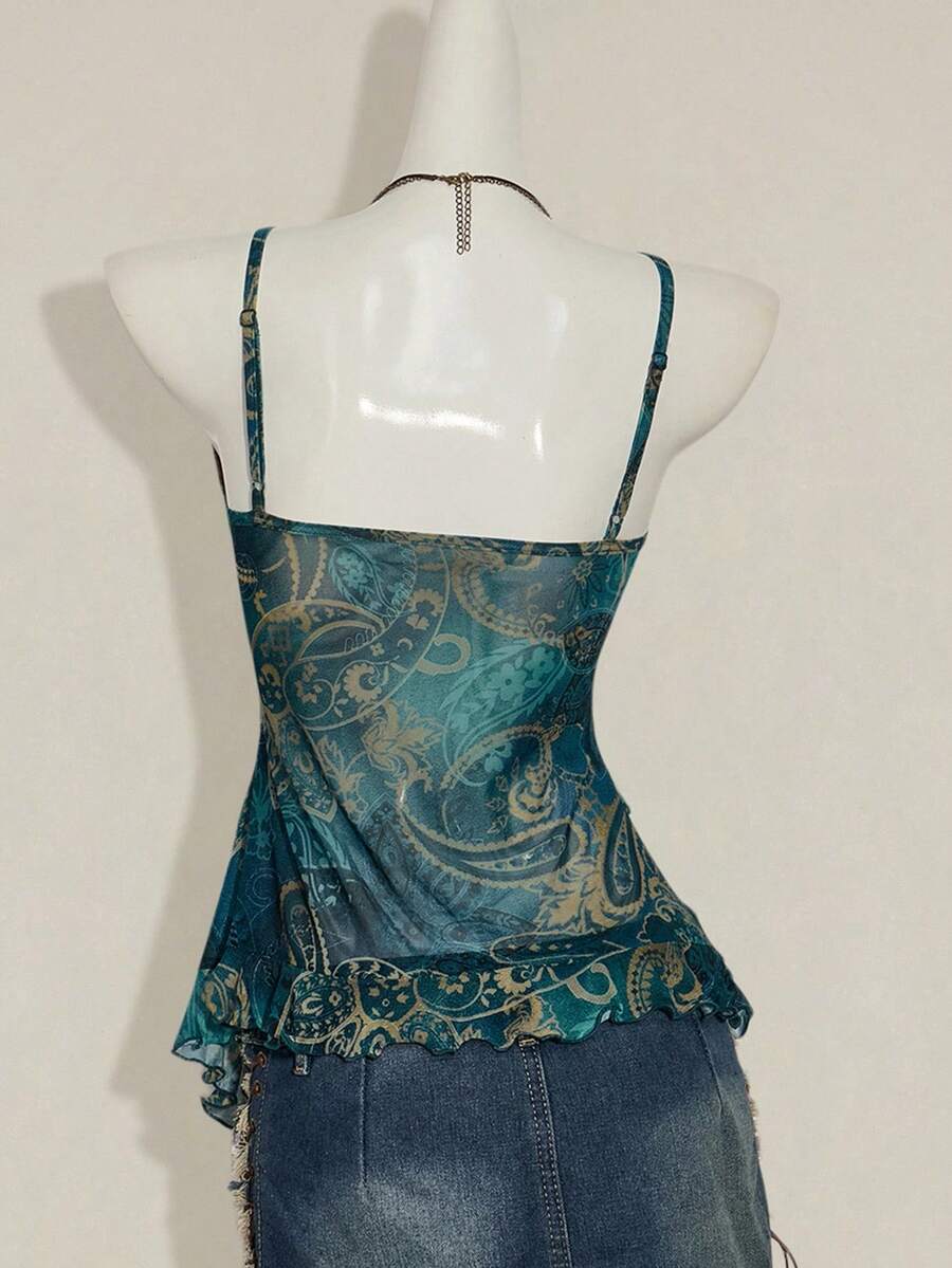 Women's burgundy floral graphic print mesh camisole top featuring an asymmetrical hem, backless cut, and spaghetti straps.