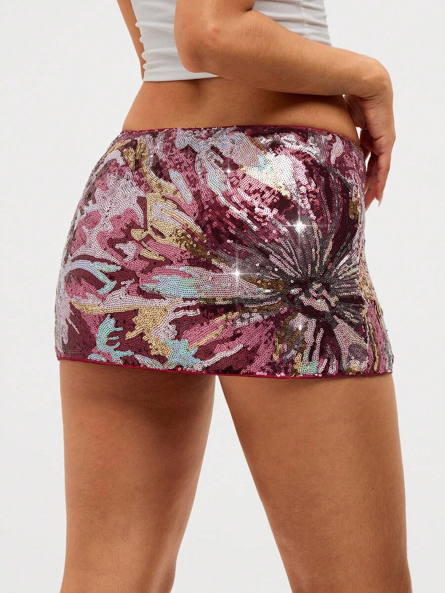 Burgundy shiny sequin bodycon mini skirt for women with low waist design, floral plant embroidery, and zipper detail.