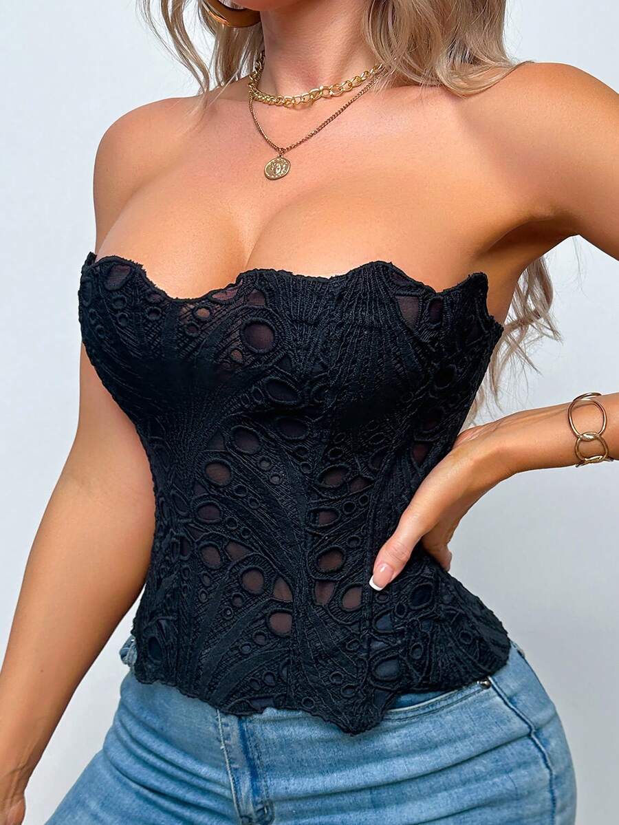 Black lace shaping camisole top with a tie-back detail and grommet eyelet accents, designed for women with slight stretch and ultra-light support.
