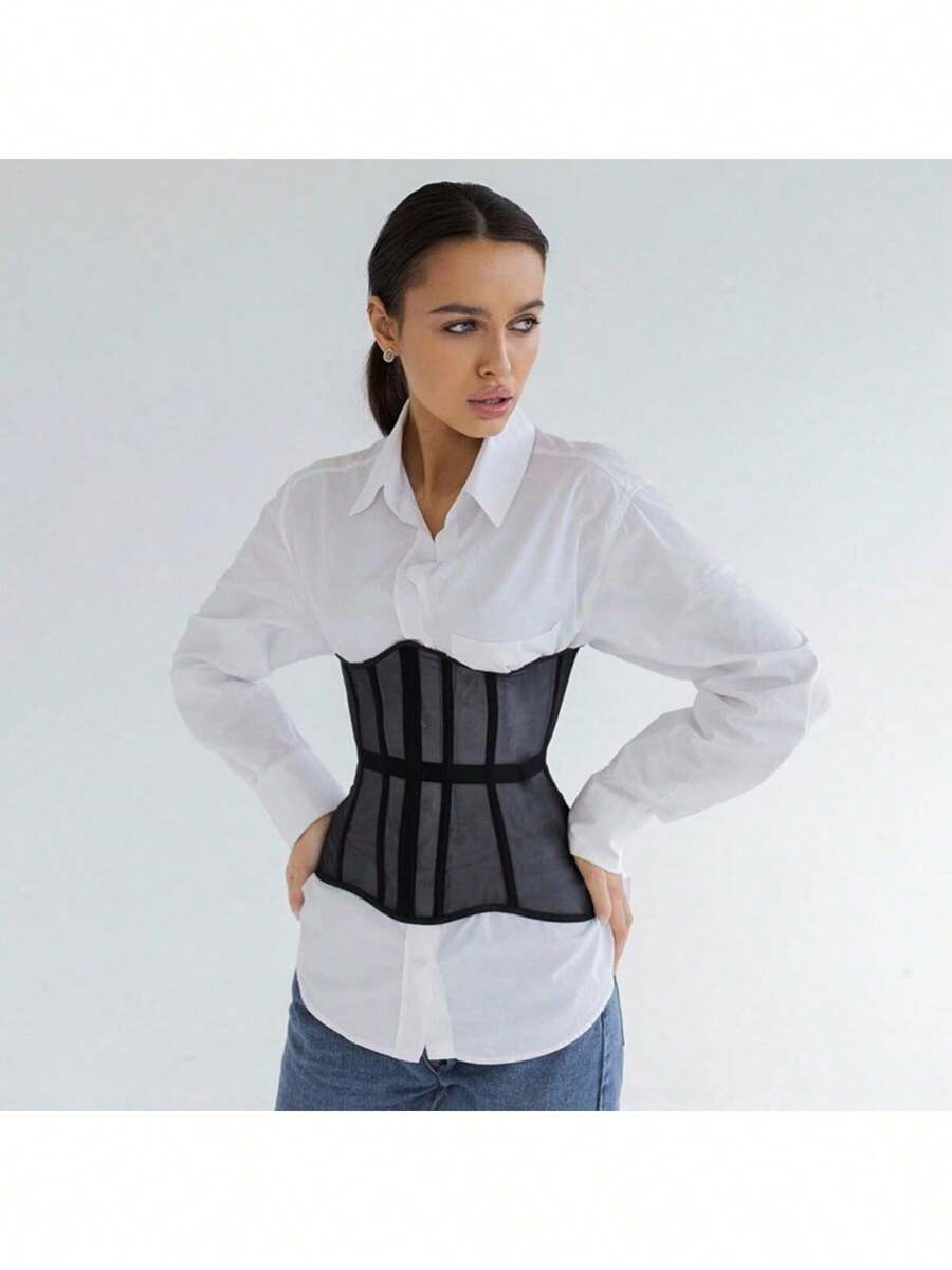 Women's apricot mesh shaping short corset with a lace-up front detail and slim-fit waist shaper design.