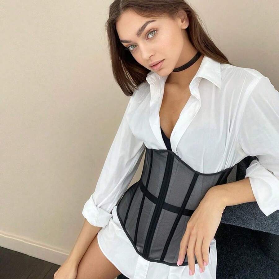 Women's apricot mesh shaping short corset with a lace-up front detail and slim-fit waist shaper design.